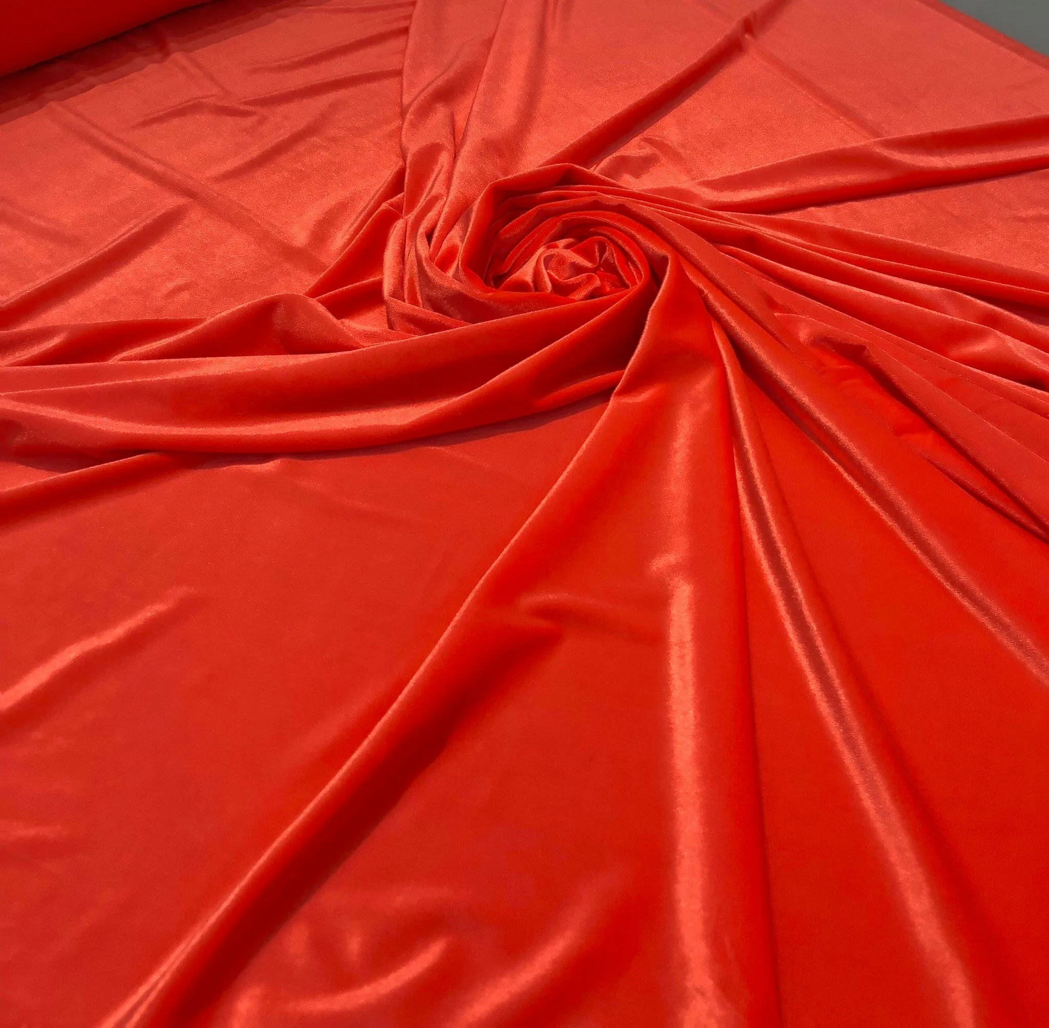 Strch velvet 60&quot; wide    Beautiful bright orange color      Fabric sold by the yard