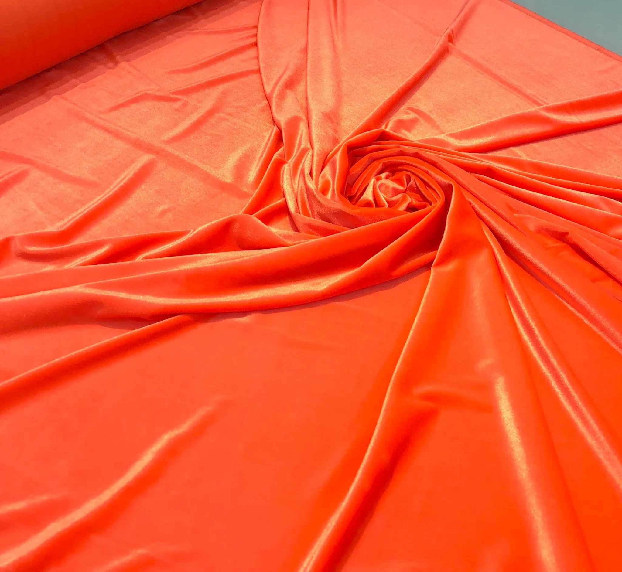Strch velvet 60&quot; wide    Beautiful bright orange color      Fabric sold by the yard